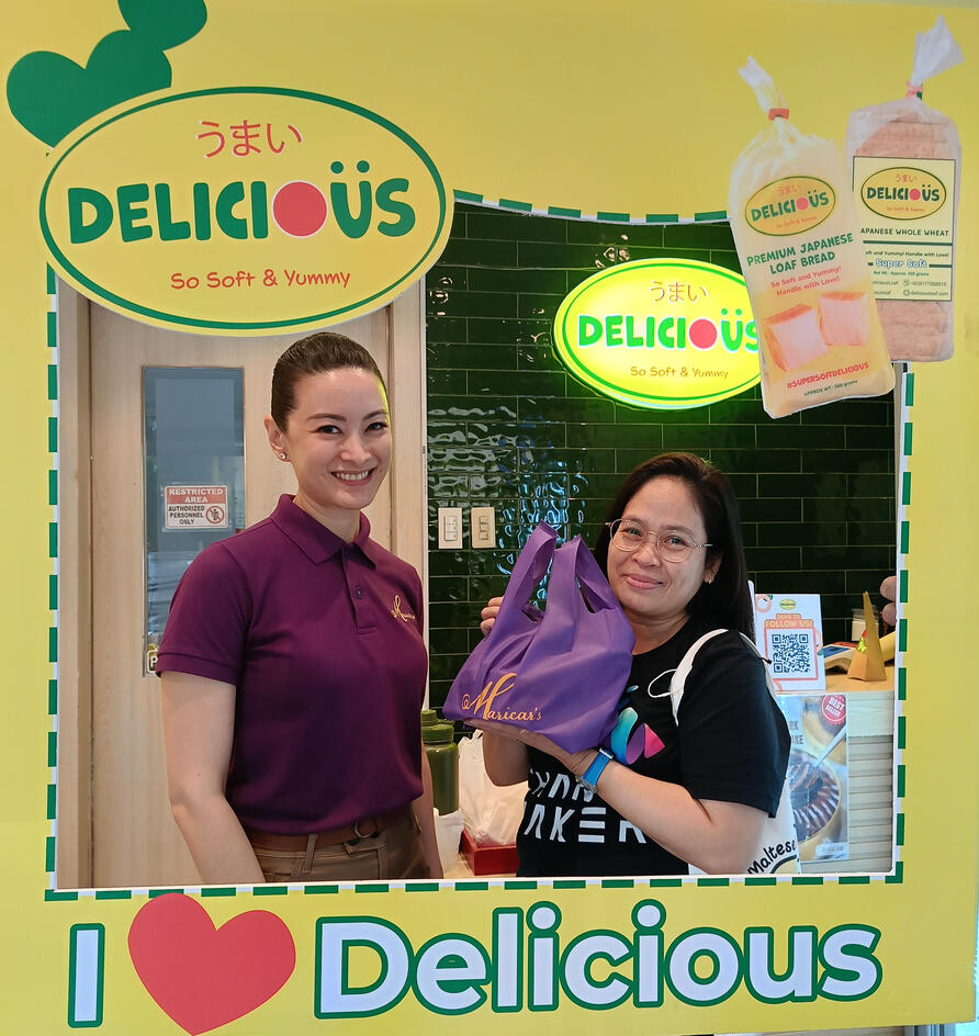 Maricar Reyes - Poon and her fan holding a frozen cake during Maricar's Meet &amp; Greet event at Everything Delicious Store E. Rodriguez Sr. Ave. branch on 26 March 2025.